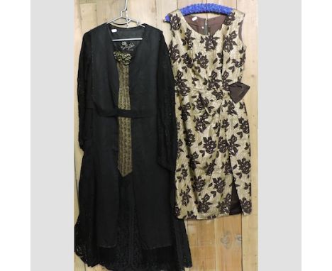 A vintage black lace dress, together with another dress and various textiles to include a silk embroidery