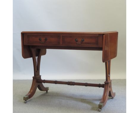 A reproduction yew wood sofa table, 90cm