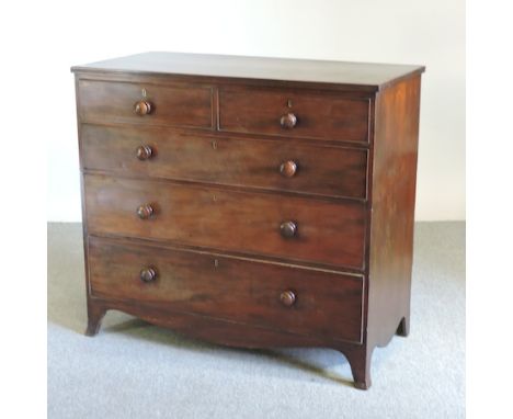 An early 19th century mahogany chest, on swept bracket feet, 112cm