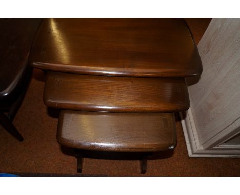 Ercol nest of three tables in elm
