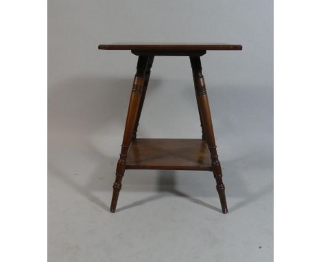 An Edwardian Mahogany Square Topped Occasional Table with Stretcher Shelf