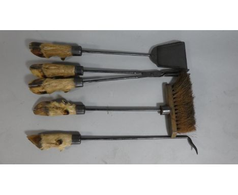 A Set of Four Early 20th Century Black Forest Fire Tools with Taxidermy Deer Hoof Handles. 58cms Long. 