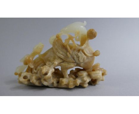 A Carved Oriental White Jade Study of an Exotic Bird. 9cms Long 