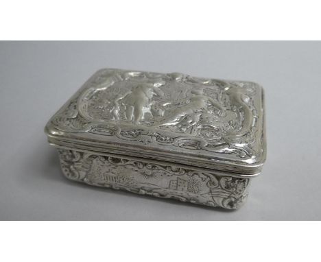 A Continental Silver Rectangular Snuff Box with Hinged Lid and Side Panels decorated in relief with Figures, Buildings and Fo