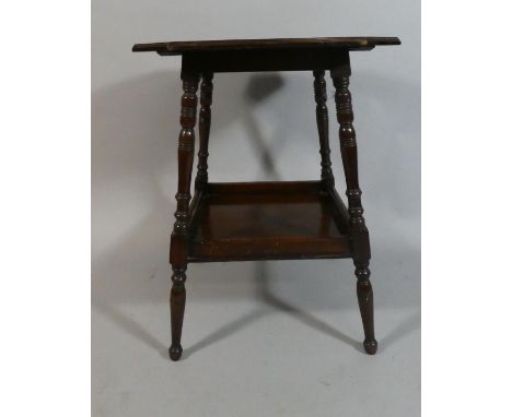 An Edwardian Mahogany Shaped Top Occasional Table with Galleried Stretcher Shelf and Turned Supports.