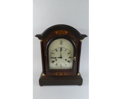 An Edwardian Inalid Mahogany Bracket Clock with Silvered Dial turned Pilasters and Silent/Chime Subsidiary Dial. 42cms High 