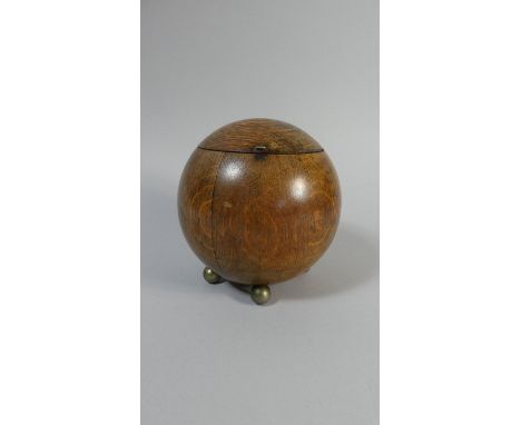 An Early 20th Century Art Deco Turned Oak Sphere Shaped Tea Caddy. The Inside Bearing the Paper Label for Teopani and Company
