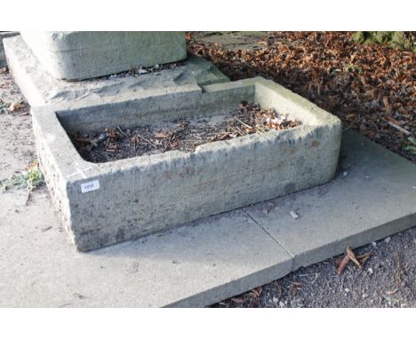 A rectangular stone hand hewn water trough, 19cm x 77cm x 46cm.Viewing & Collection: Viewing is online only from imagery and 