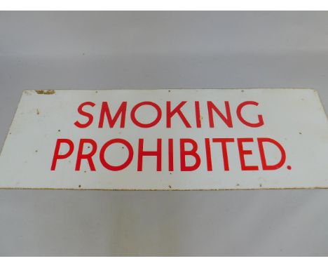 An enamel Smoking Prohibited sign, red on white, 61cm x 182.5cm.