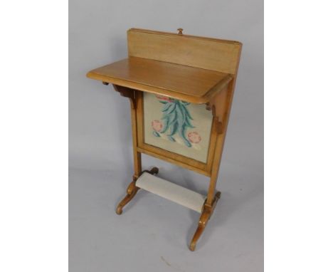 A George IV mahogany dropleaf reading table with fire screen, raised on cabriole legs, 82cm high.