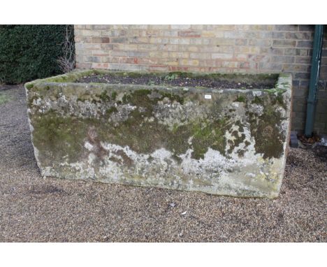 An impressive rectangular hand hewn stone trough, 71cm x 187cm x 100cm.Viewing & Collection: Viewing is online only from imag