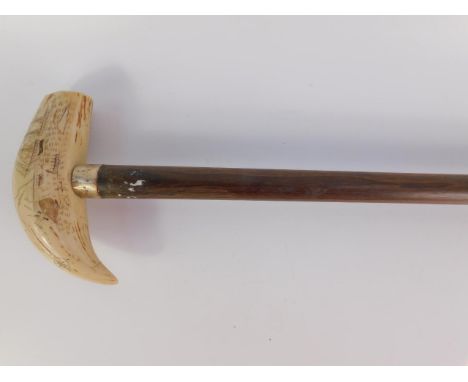 A bone scrimshaw walking stick 'The Whaler Eagle', rosewood shaft, 91cm long.