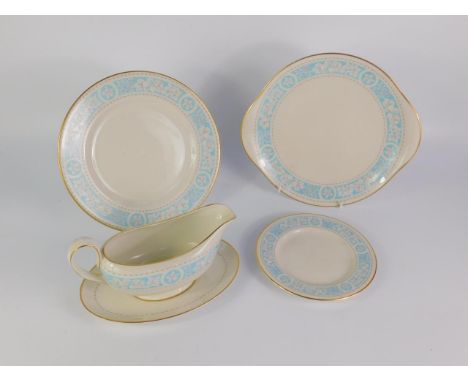 A Royal Doulton porcelain part dinner and tea service, decorated in the Hampton Court pattern comprising sauce boat on stand,