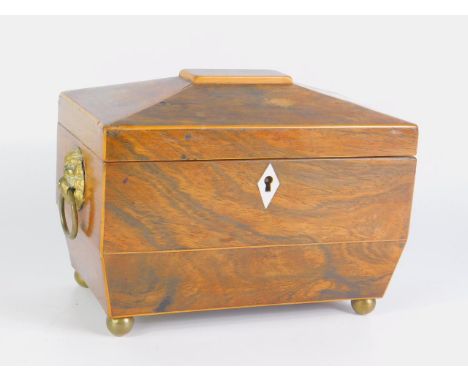A Regency rosewood sarcophagus tea caddy, with boxwood line inlay, twin brass lion's mask and ring handles, twin compartment,