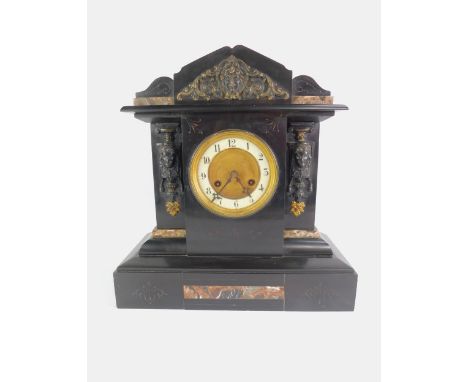 A Victorian slate and marble mantel clock of architectural form, brass dial with enamel chapter ring bearing Arabic numerals,