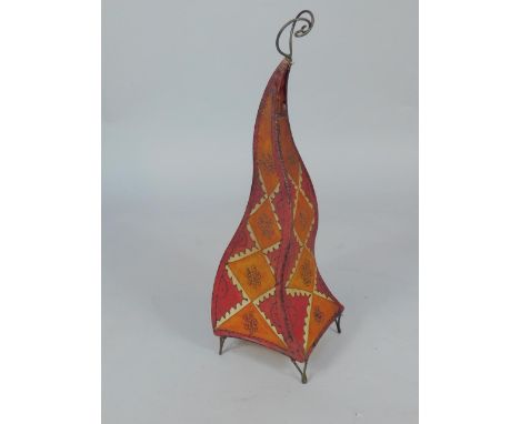 A Moroccan 1960's kid skin Hannon lamp, with painted red and orange geometric decoration, iron frame with carrying handle, 82
