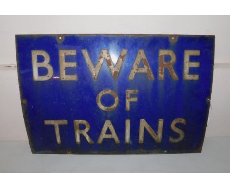 A Beware of Trains blue enamel sign, 45cm x 68.5cm.