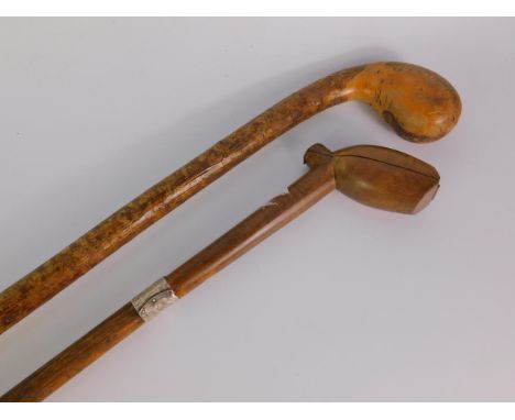 An early 20thC pipe holder walking stick, with a silver ferule, London 1928, 82cm long, together with a hazel walking stick, 