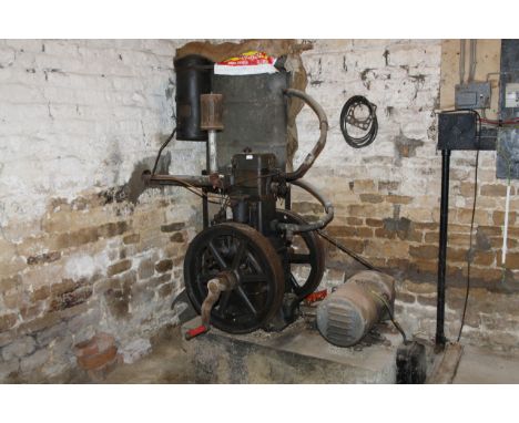 An R A Lister stationary engine, with water tank and generator.To be viewed on site at Grange Lodge, Irnham Road, Corby Glen,