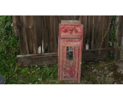 E. R. Cast Iron Post Box, Red painted in weathered condition, With royal insignia E.R. previously set into wall recess, F, (n