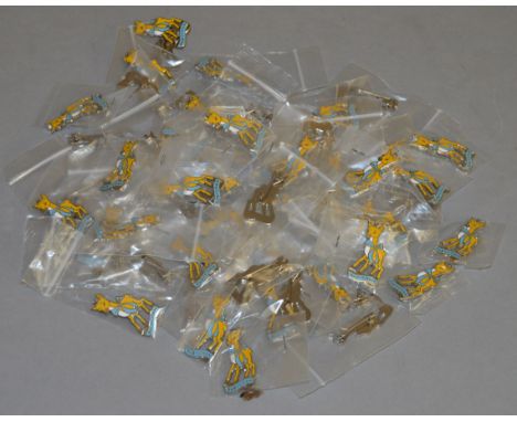 Approx 65 vintage Babycham enamel badges.