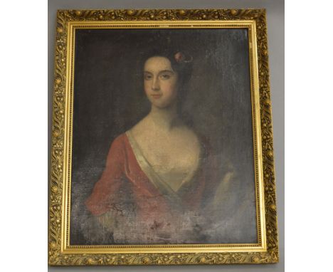 An 18th/19th century oil on board depicting a portrait of a young woman in period clothing. Framed 82cm x 69cm.