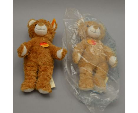 2 Steiff teddy bears.