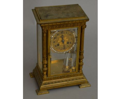 A four glass chiming mantle clock with French movement. Movement marked "AD MOUGIN DEUX MEDALLES". with a mercury pendulum. 3