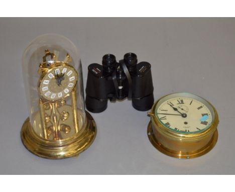 A Smiths ship clock together with a Haller dome clock and a cased set of binoculars.