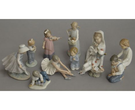 11 Assorted Nao porcelain figures.