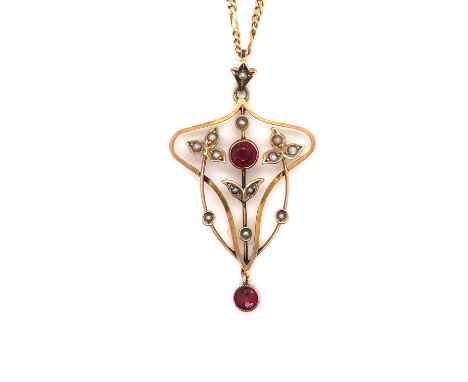 AN ANTIQUE 9ct GOLD SEED PEARL AND STONE SET ART NOUVEAU STYLE PENDANT SUSPENDED ON A FIGARO STYLE CHAIN, UNHALLMARKED WITH T
