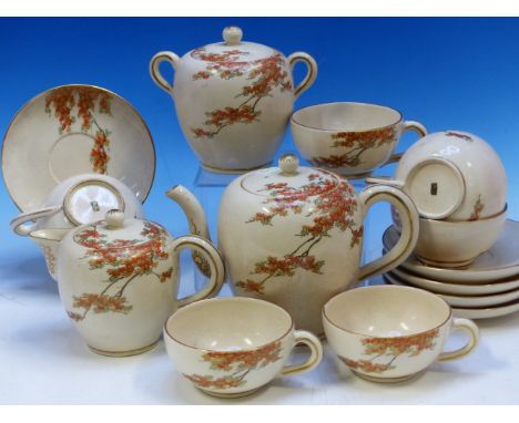 A JAPANESE SATSUMA PART TEA SET PAINTED WITH BRANCHES OF AUTUMNAL MAPLE, COMPRISING: COVERED TEA POT, SUGAR BOWL AND MILK JUG