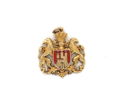 A WATCH FOB CHARM ENAMELLED IN RED ABOUT THE ARMORIAL OF HAMBURG, 585 STAMP, AND ASSESSED AS 14ct. WEIGHT 7.0grms. 