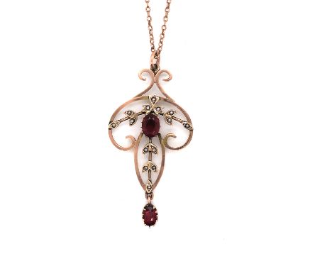 AN ART NOUVEAU STYLE SEED PEARL AND STONE SET PENDANT, STAMPED 9ct AND SUSPENDED ON A ROSE GOLD BELCHER CHAIN. BOTH ASSESSED 