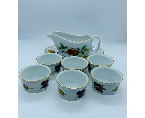 Six Royal Worcester ramekins and gravy boat