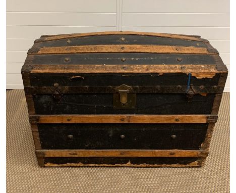 A travel chest/steamer trunk, metal and wood banded 