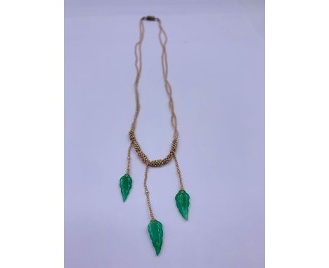 A  Chinese jade and seed pearl necklace 
