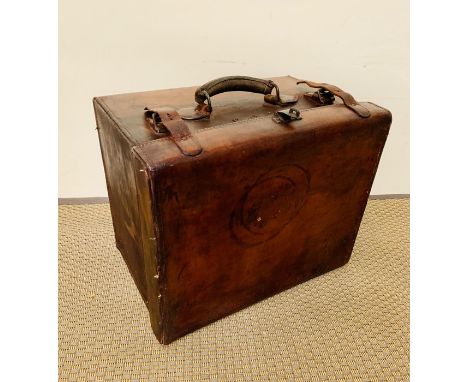 A brown leather travel trunk by M. Wurzl &amp; Sohne, Wien-Carlsbad, Austria  