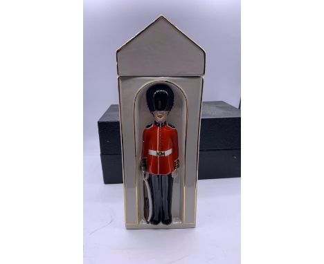 A Boxed Sentry themed decanter by Masons.