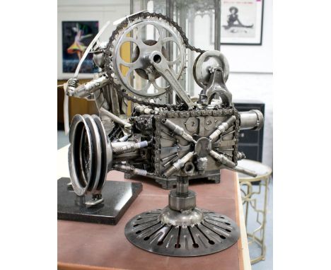 CINE CAMERA, made from machine parts on circular base, 45cm H.