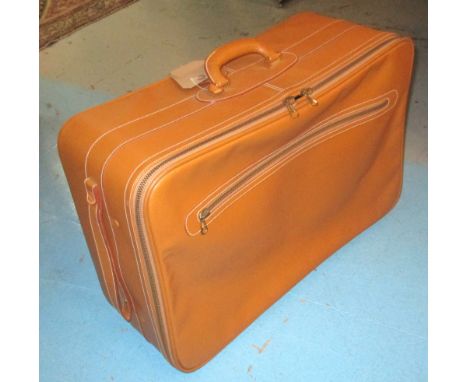 ASPREY SUITCASE, light tan leather, with zipped compartments and cotton lined interior, 41cm x 58cm x 23cm.