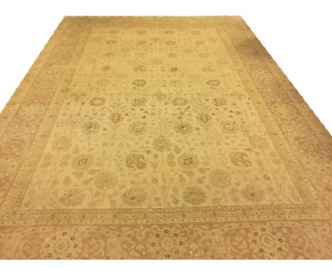 VERY FINE ZIEGLER TABRIZ DESIGN CARPET, 505cm x 347cm, all over palmette, flowerhead and vines on an ivory field within Haji 