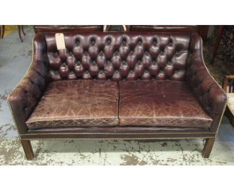 SOFA, Georgian style in burgundy buttoned leather, 79cm D x 77cm h x 136cm W. (with faults)