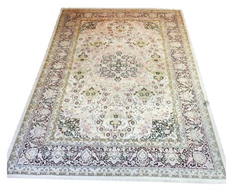 FINE PURE SILK PERSIAN TEHRAN DESIGN CARPET, 330cm x 212cm, central medallion on an ivory field of palmettes and scrolling vi