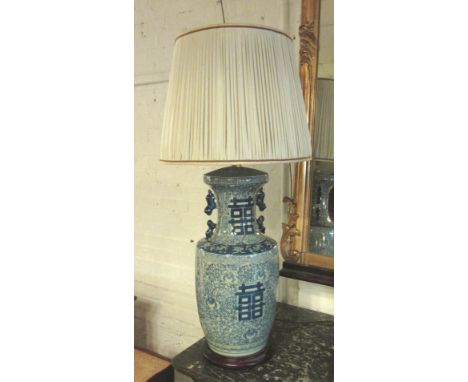 TABLE LAMP, Oriental style blue and white with foliate decoration and a beige pleated shade, 98cm H. 