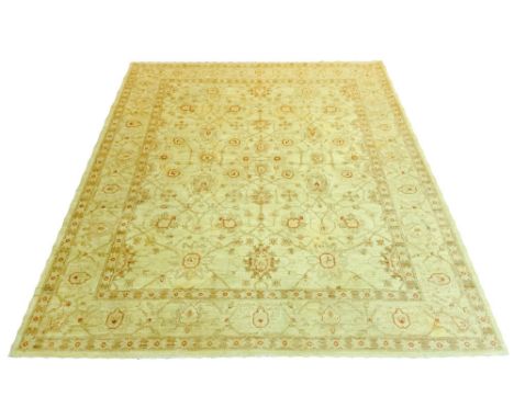 FINE ZIEGLER CARPET, 295cm x 246cm, all over sultanabad palmette and vine design on an  ivory field within corresponding bord