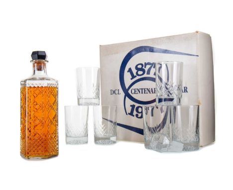 DCL CENTENARY DECANTER AND GLASSES SET 1977Blended whisky.No stated ABV / Approximately 75clPlease note that these decanters 