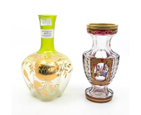 A 19th century style Continental faceted glass vase, ruby flash, gilt detail, cartouches painted with roses, with a label 'SV