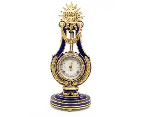 A 20th century porcelain mantel clock with gilt metal mounts&nbsp;