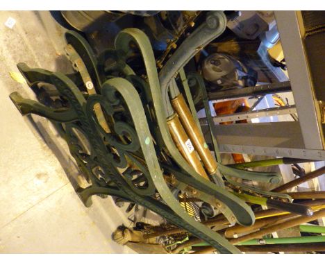 Three pairs of cast iron garden bench ends 